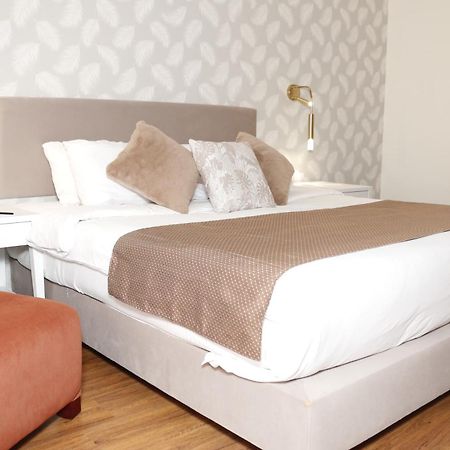 Tolip Family Park Hotel Kairo Exterior foto A bedroom at the hotel