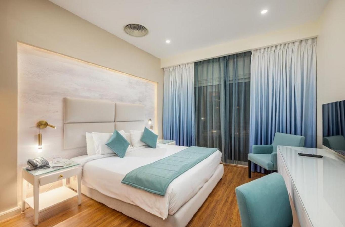 Tolip Family Park Hotel Kairo Exterior foto A bedroom at the hotel