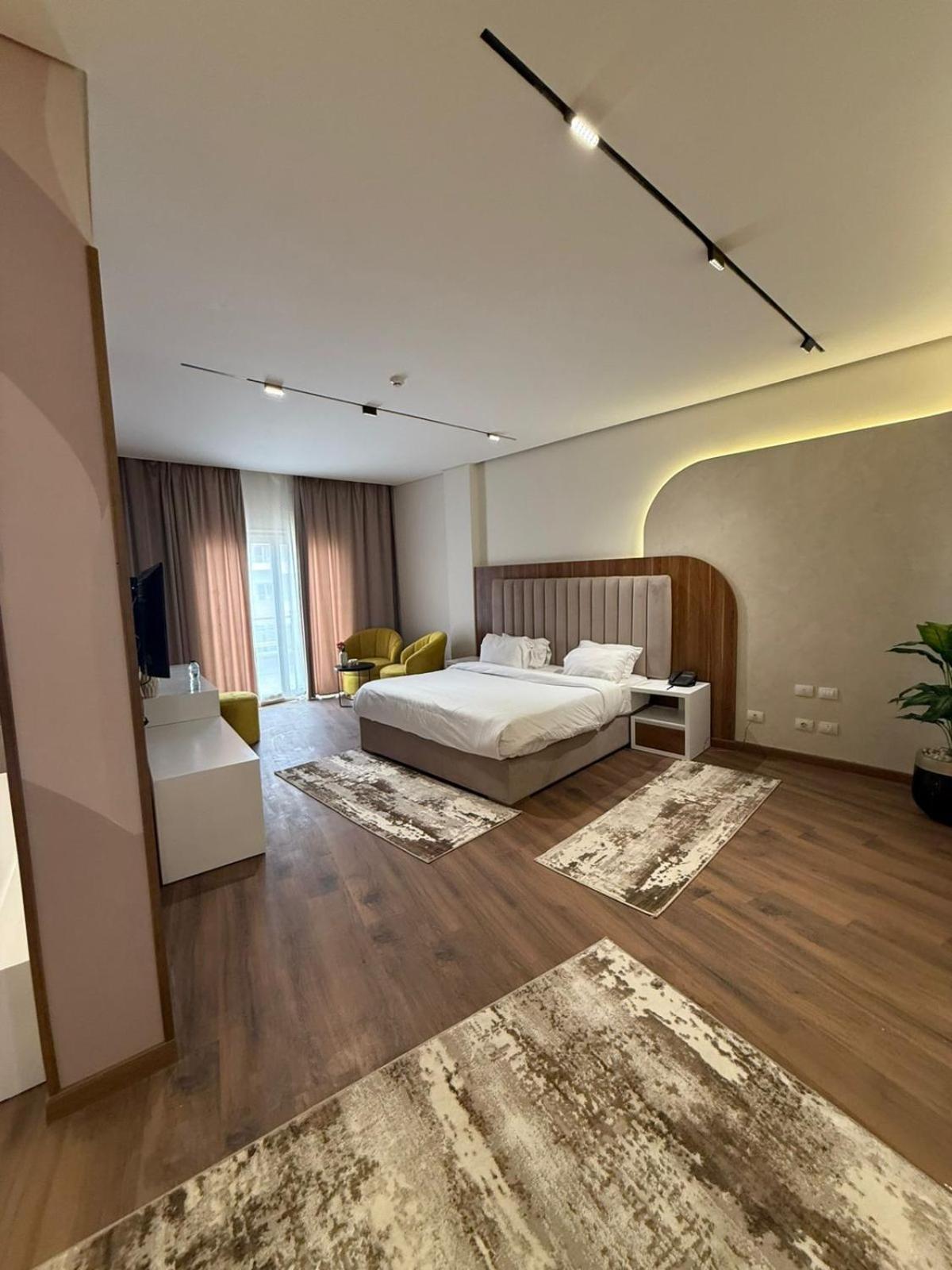 Tolip Family Park Hotel Kairo Exterior foto A bedroom at the hotel